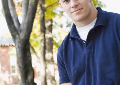 Portrait of a student holding a book