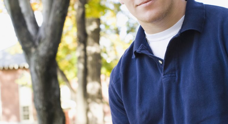 Portrait of a student holding a book