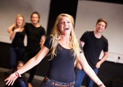 Students Taking Singing Class At Drama College. Student Singing